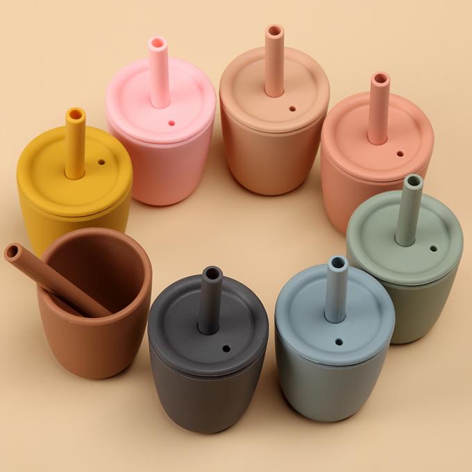 Taza sana al por mayor del agua de biberón de los niños del silicón de la categoría alimenticia con la taza del niño del entrenamiento de la tapa de Sippy