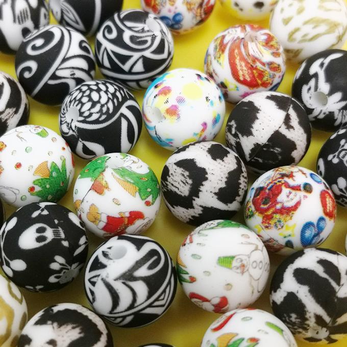 Al por mayor el silicón impreso de encargo de 12m m gotea las gotas a granel cauchutosas de Teether del silicón del estampado leopardo para el juguete de la dentición del bebé de DIY