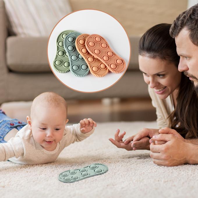 Bebé formado zapato suave orgánico Teether del silicón del juguete de la tensión de la persona agitada del silicio de 2021 niños del nuevo producto