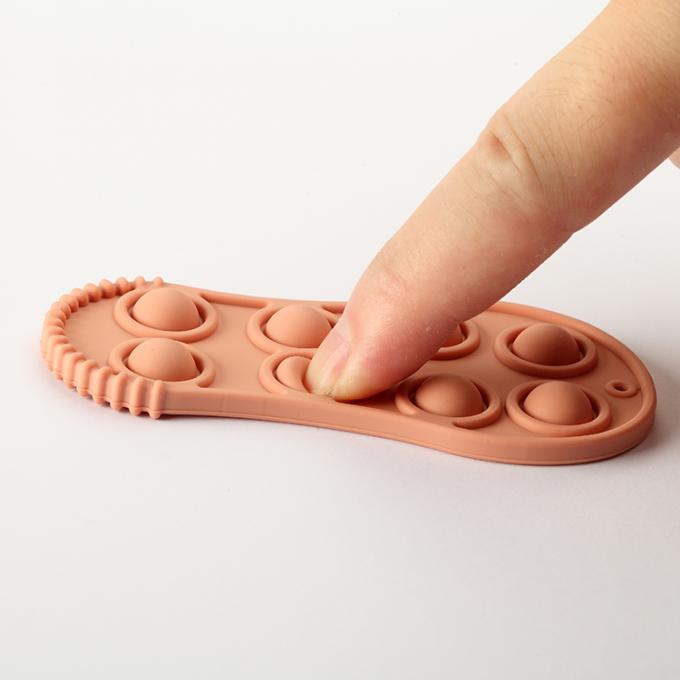 Bebé formado zapato suave orgánico Teether del silicón del juguete de la tensión de la persona agitada del silicio de 2021 niños del nuevo producto