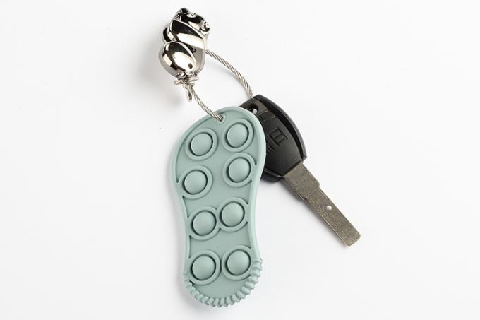 Bebé formado zapato suave orgánico Teether del silicón del juguete de la tensión de la persona agitada del silicio de 2021 niños del nuevo producto