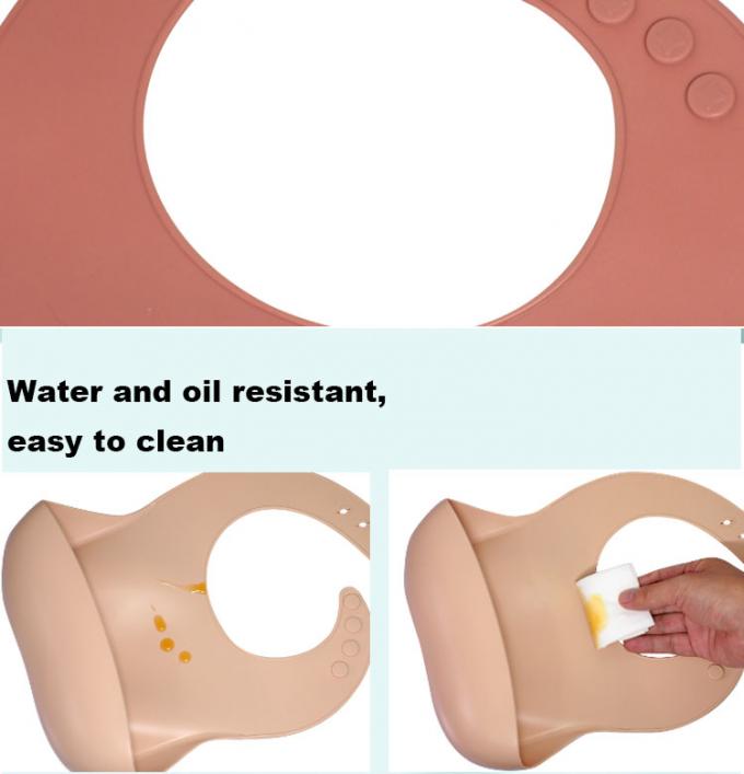 Babero impermeable suave libre de encargo del bebé del silicón de BPA con el colector de la comida