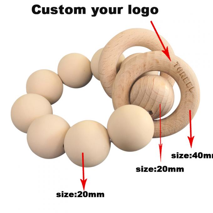 Teether de encargo del bebé del silicón de los juguetes de las gotas del silicón con la pulsera de madera 2